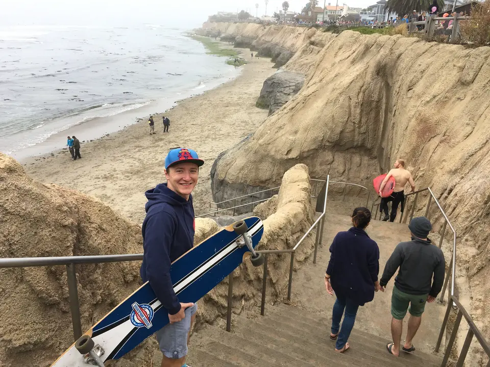 Vova with a longboard in Santa Cruz